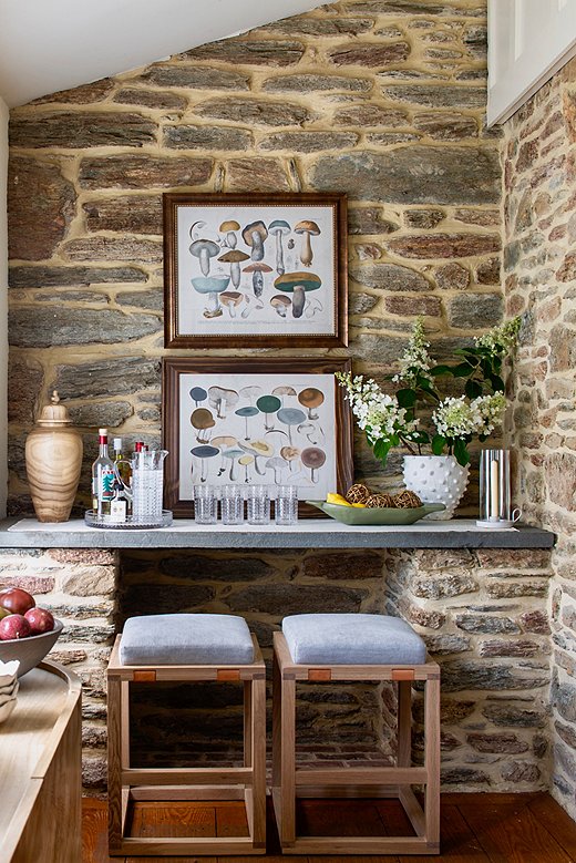 Backless stools like the Orly tuck perfectly under the counter—important in a narrow space like this one. 
